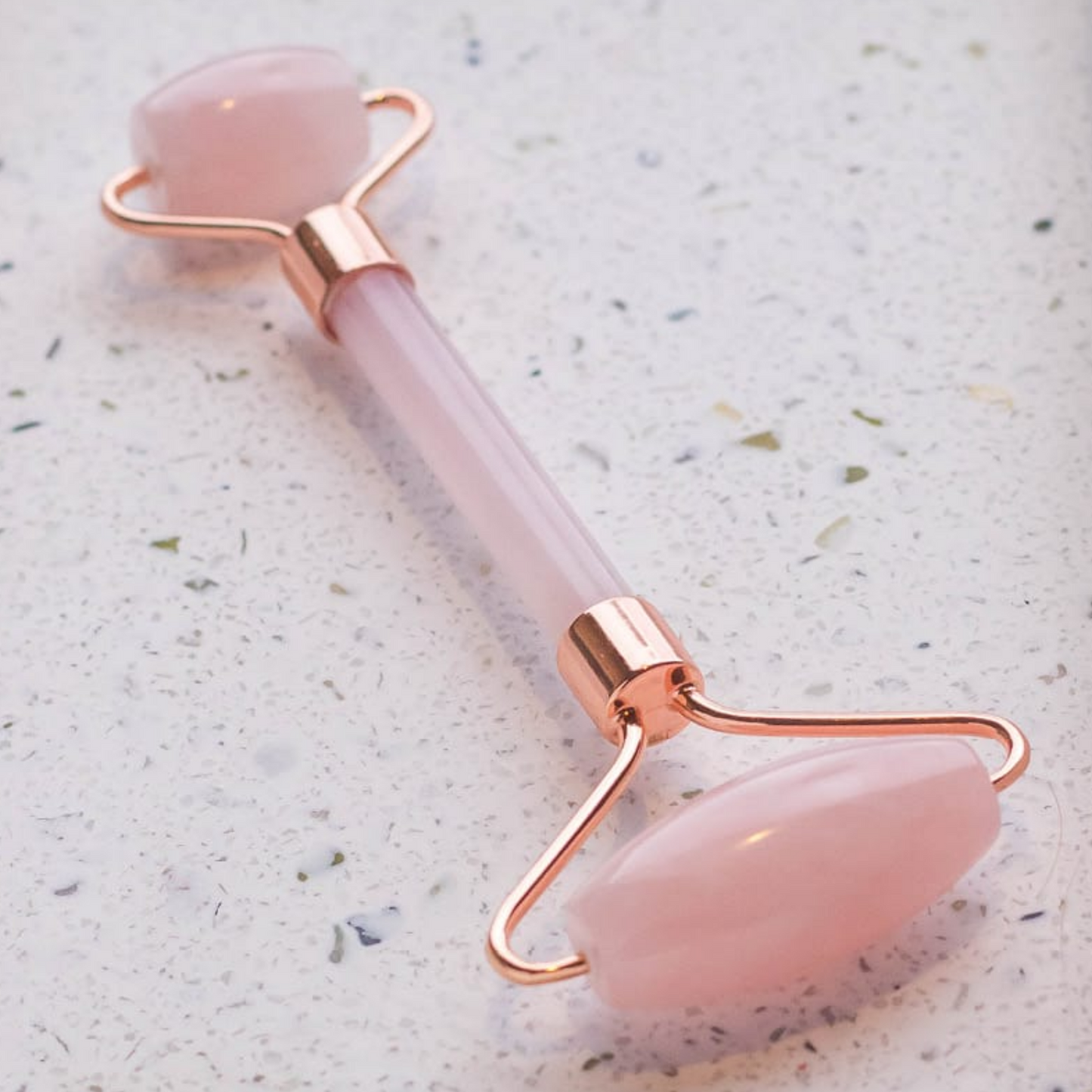 The Rose Quartz De-Puffing Face Roller With Certificate